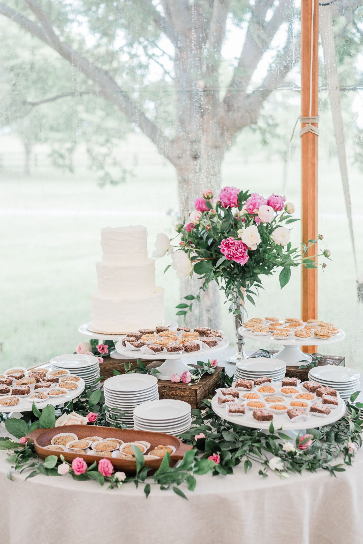 Wedding dessert table with cake and assorted desserts