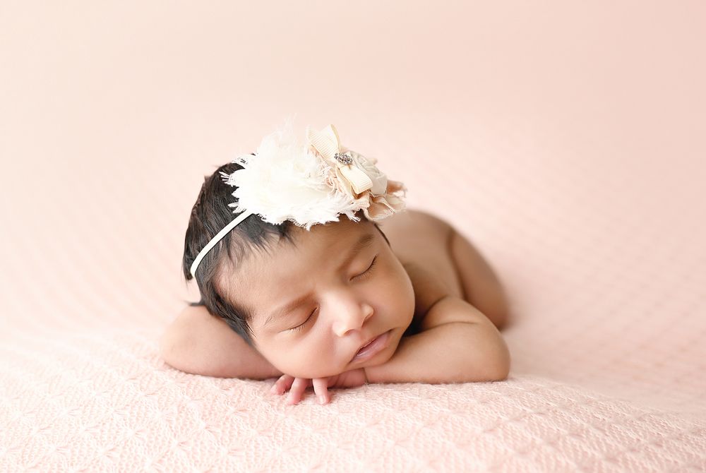 Newborn Chin on hands