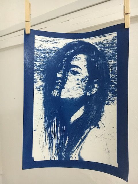 composited cyanotype of a woman against the sea by fine artist Logan C Thomas barbados