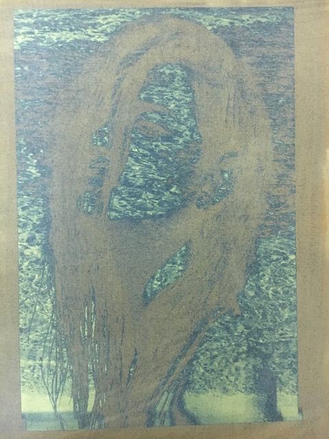An undeveloped, composited cyanotype of a woman against the sea by fine artist Logan C Thomas barbados