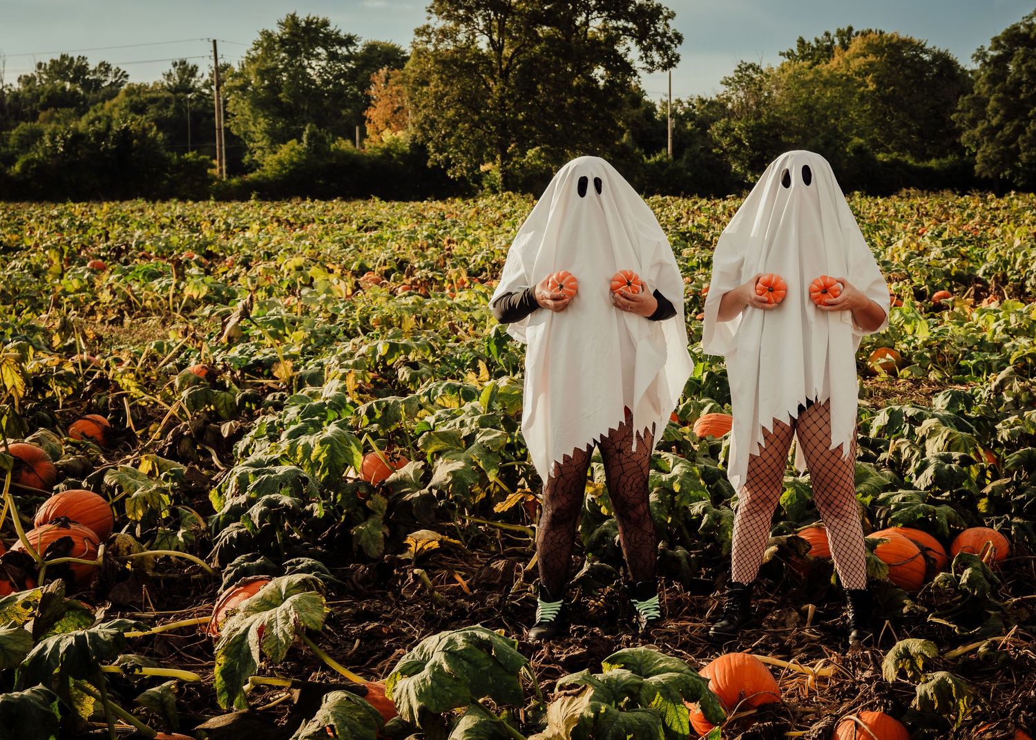 Best friends dressed up as ghosts