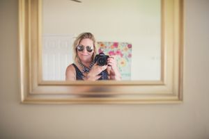Interior shots of framed photos on a beige wall in sequence.