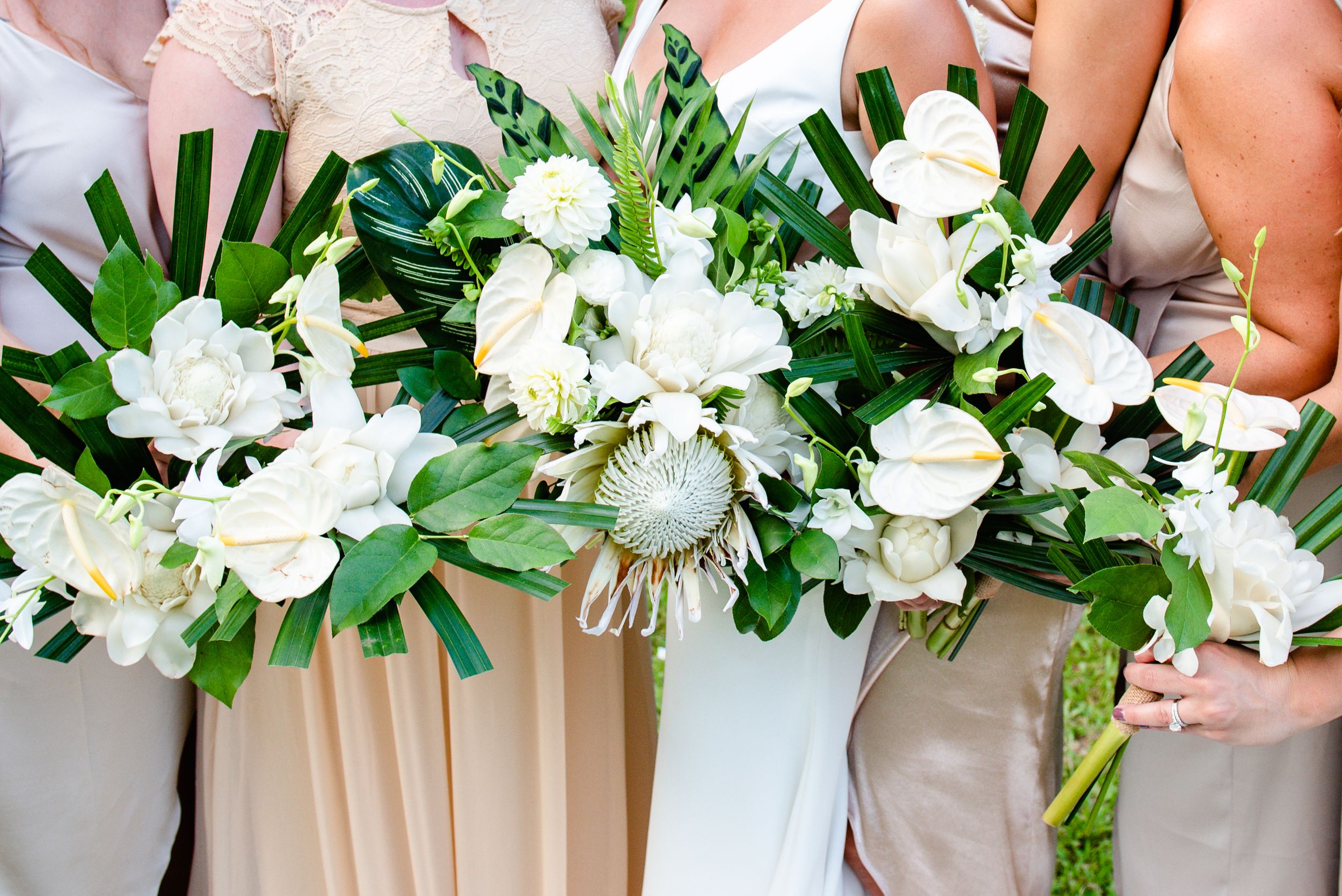 Wedding party group portrait photos of tropical bouquet, Oahu Hawaii.