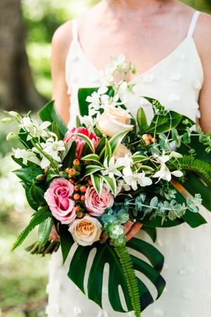 Oahu Hawaii elopement photographer capturing romantic garden portraits of wedding bouquet.
