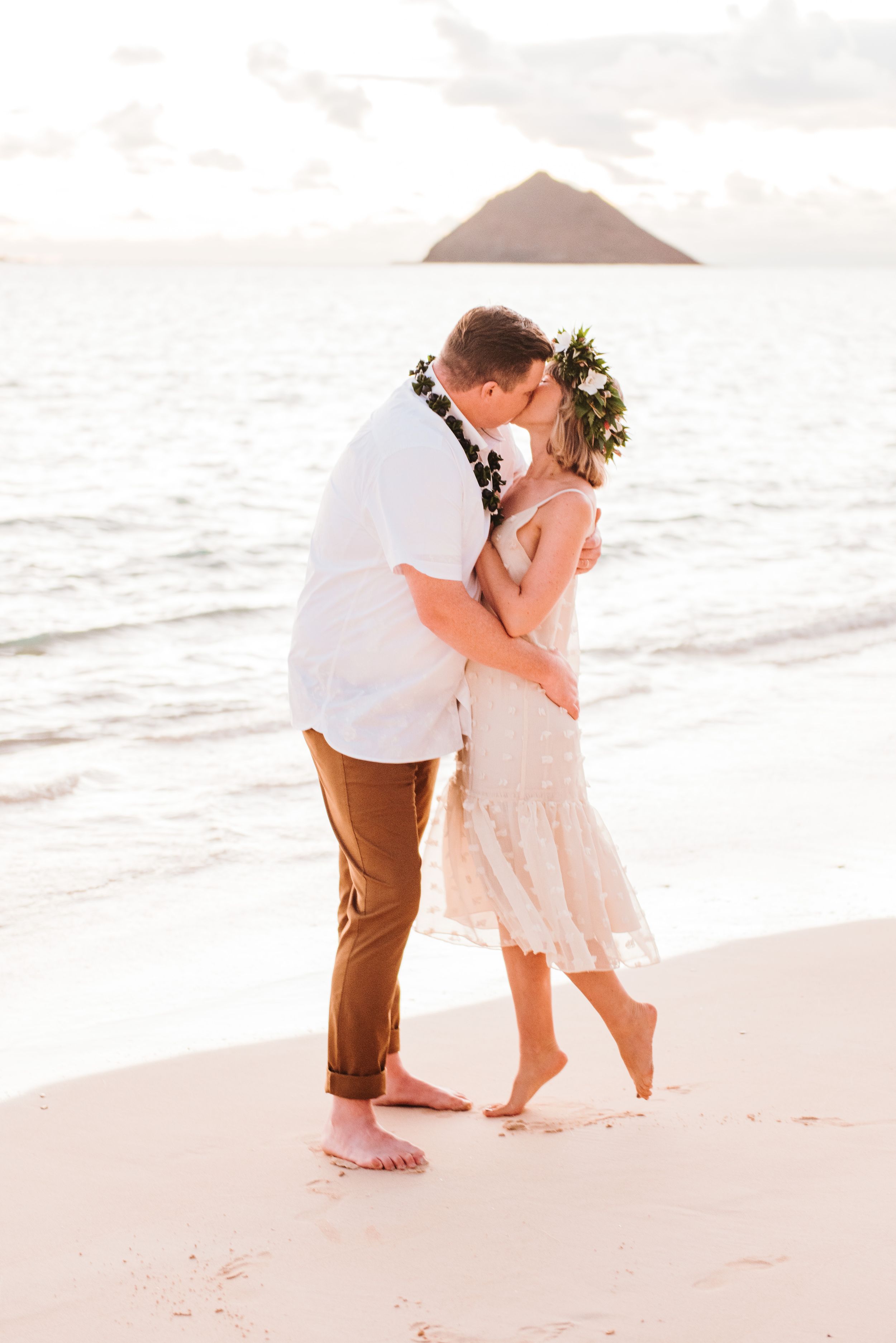 Oahu Hawaii elopement photographer capturing romantic sunrise portraits.