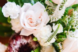 Close up of wedding ring in bridal bouquet in Waimanalo, Oahu.