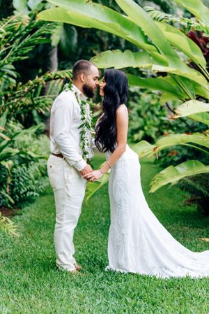 Romantic destination wedding at sunset in Waimanalo Oahu.