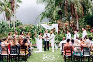 Romantic destination wedding at sunset in Waimanalo Oahu.