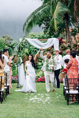 Romantic destination wedding at sunset in Waimanalo Oahu.