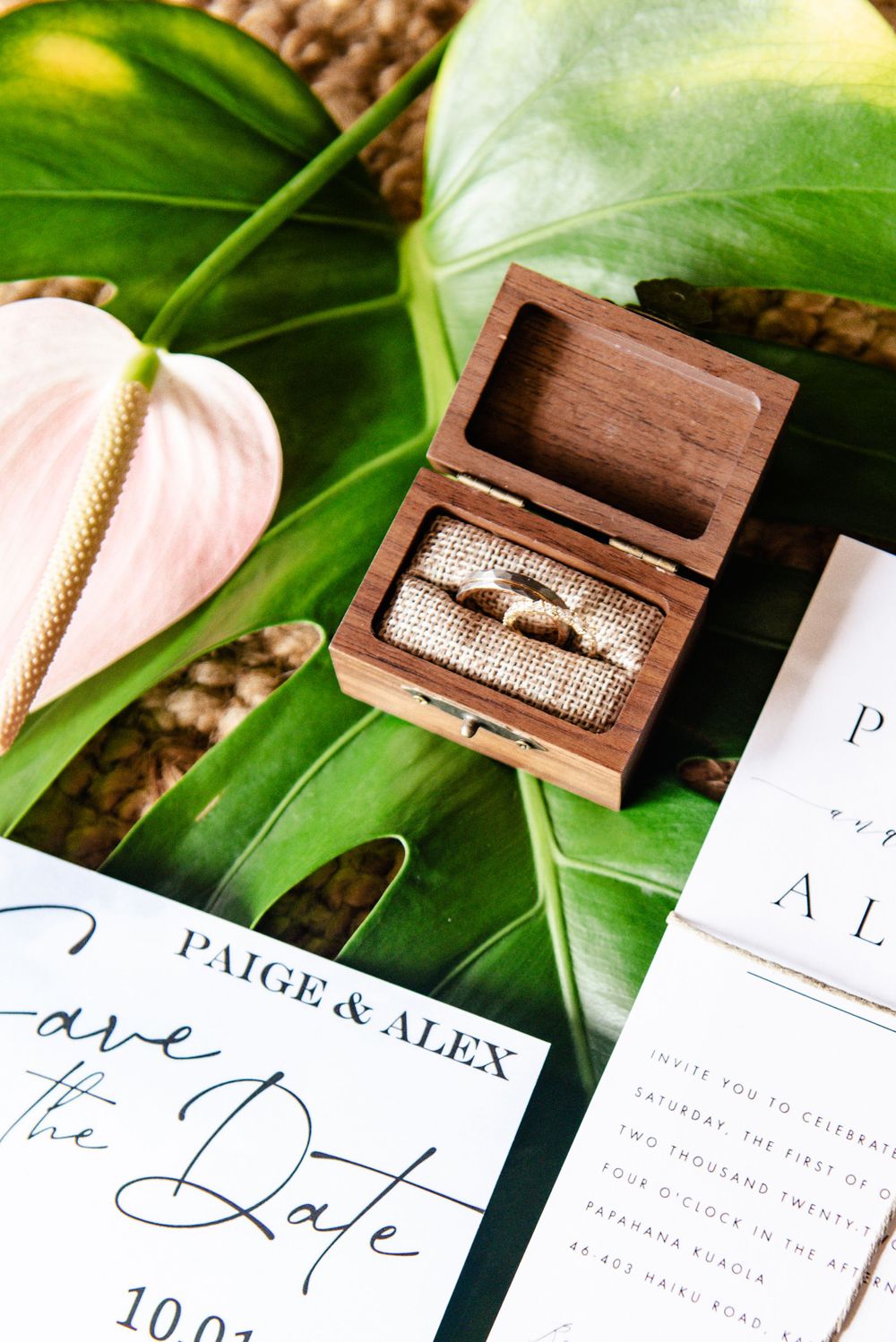 Wedding invitation flat lay with tropical details in Oahu, Hawaii.