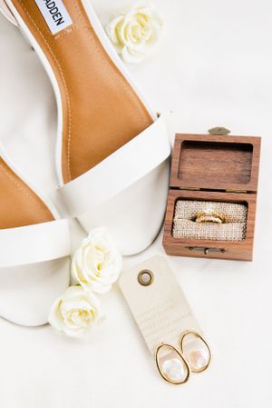 Oahu Hawaii wedding photographer capturing bridal shoes, rings and jewelry details.