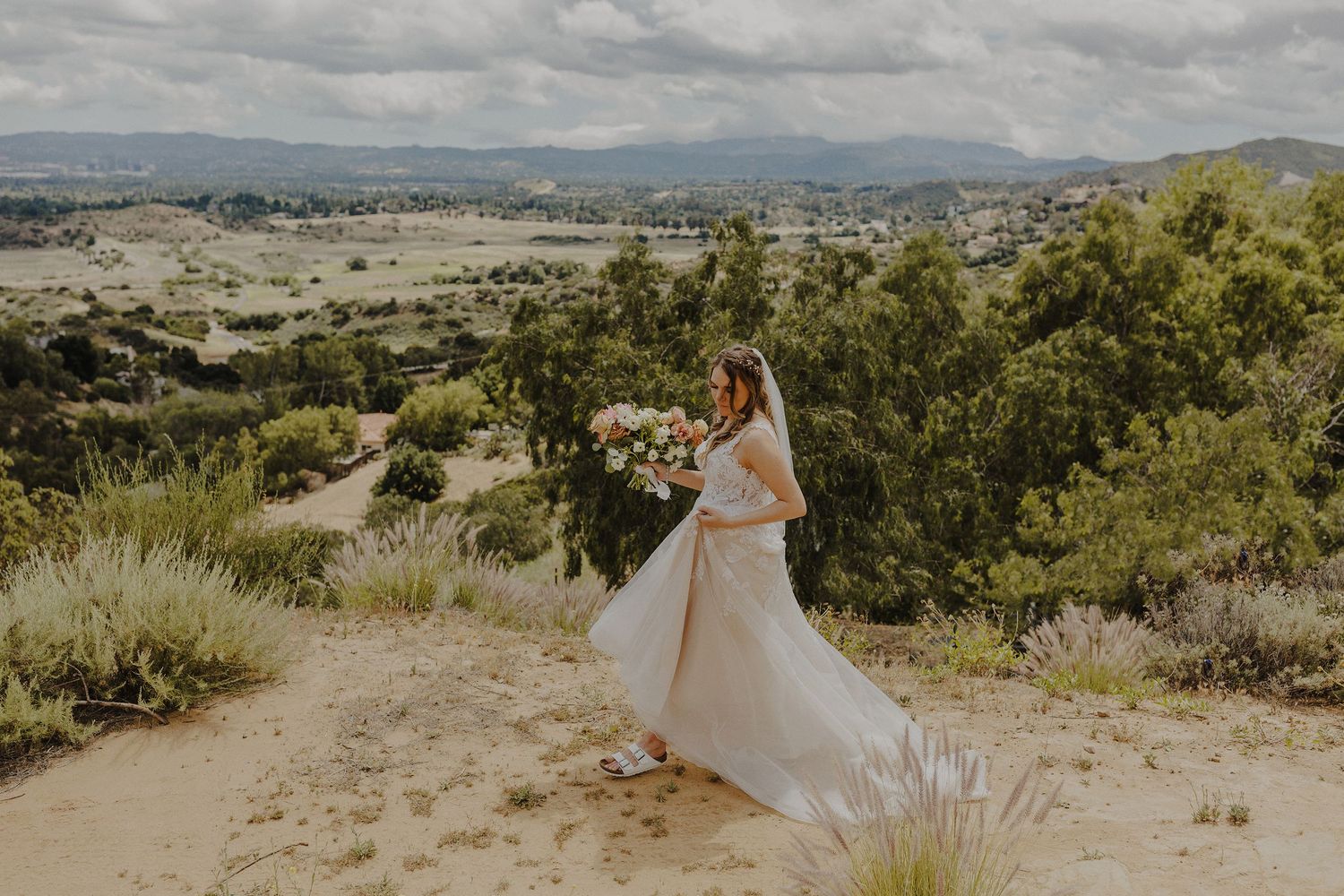 E Noelle Photography in-home wedding in Hidden Hills Los Angeles, untraditional bridal portrait walking