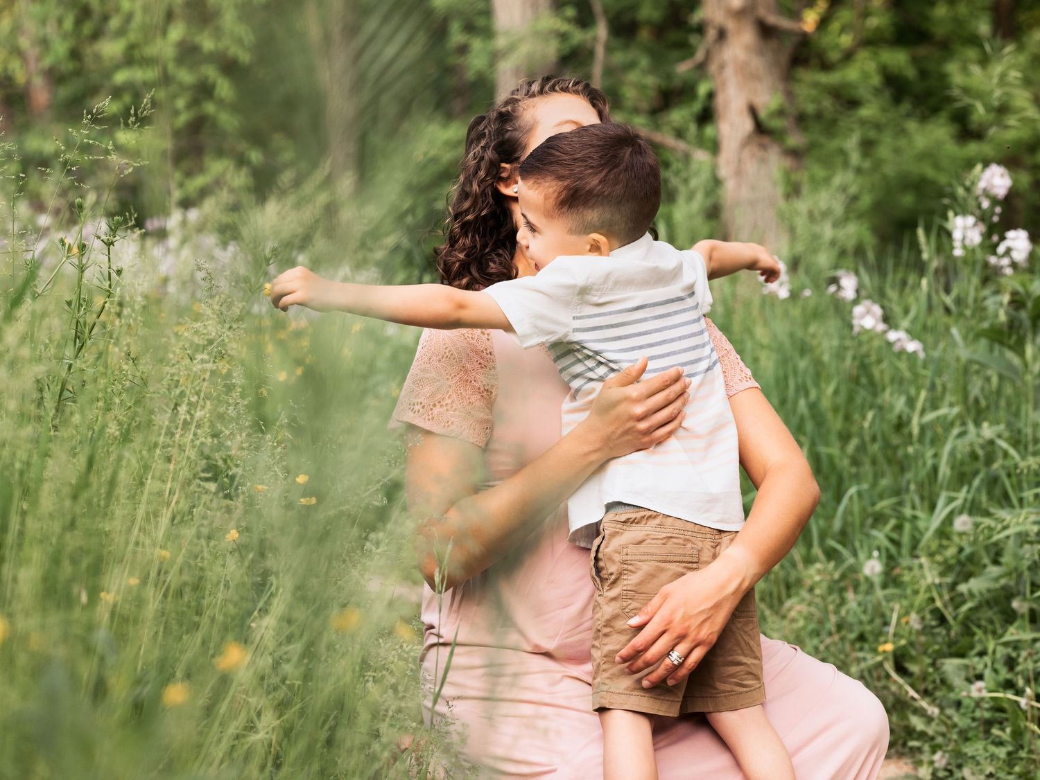 family photography son embraces mother
