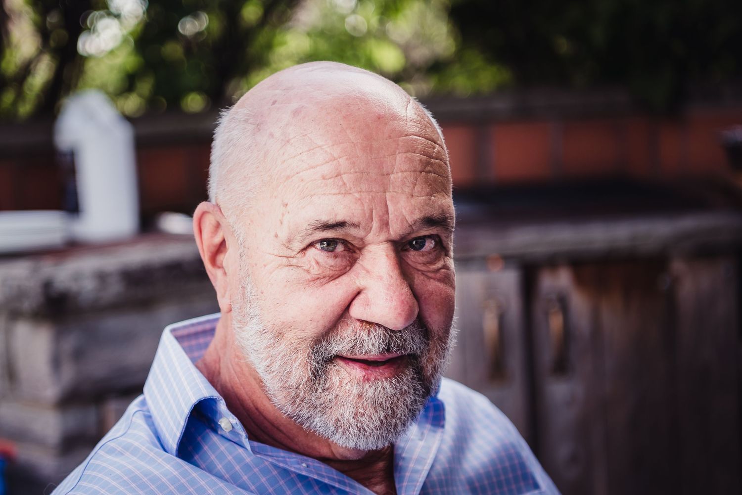 Colour photo of a caucasian man looking at the camera.