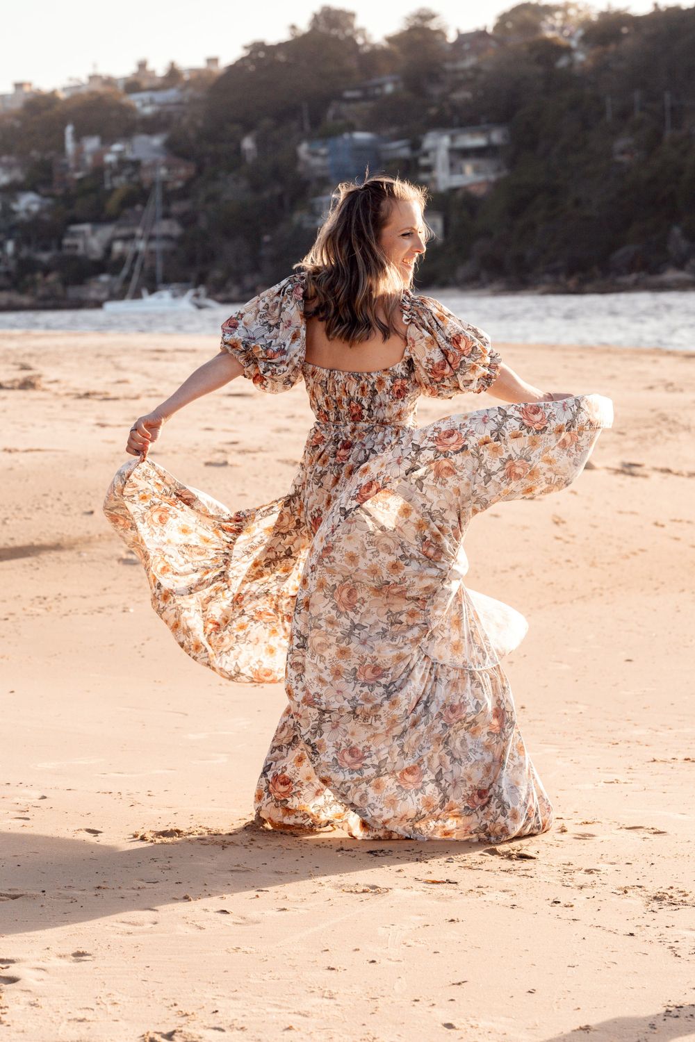 Mom is having fun wit ha beautiful dress during a family photoshoot in Sydney