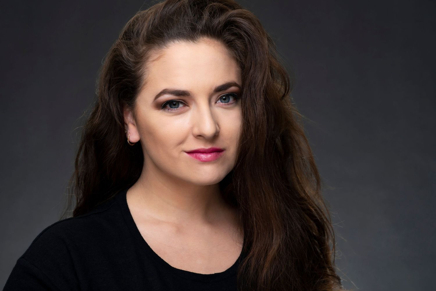 gorgeous actress with long dark hair and blue eyes