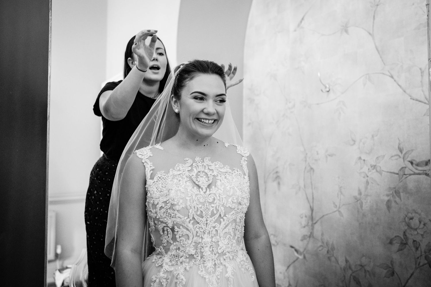 Bride having veil put on at The Orangery