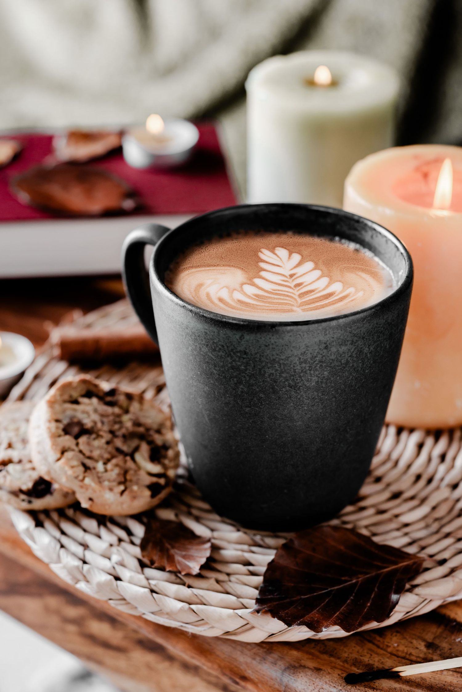 close up of coffee with candles around, autumnal themed, festive, cozy, stock photos