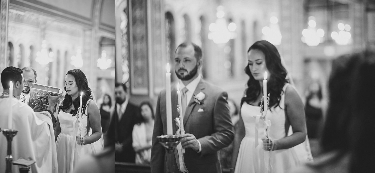 Black and white photograph of a wedding ceremony in a grand church sanctuary.