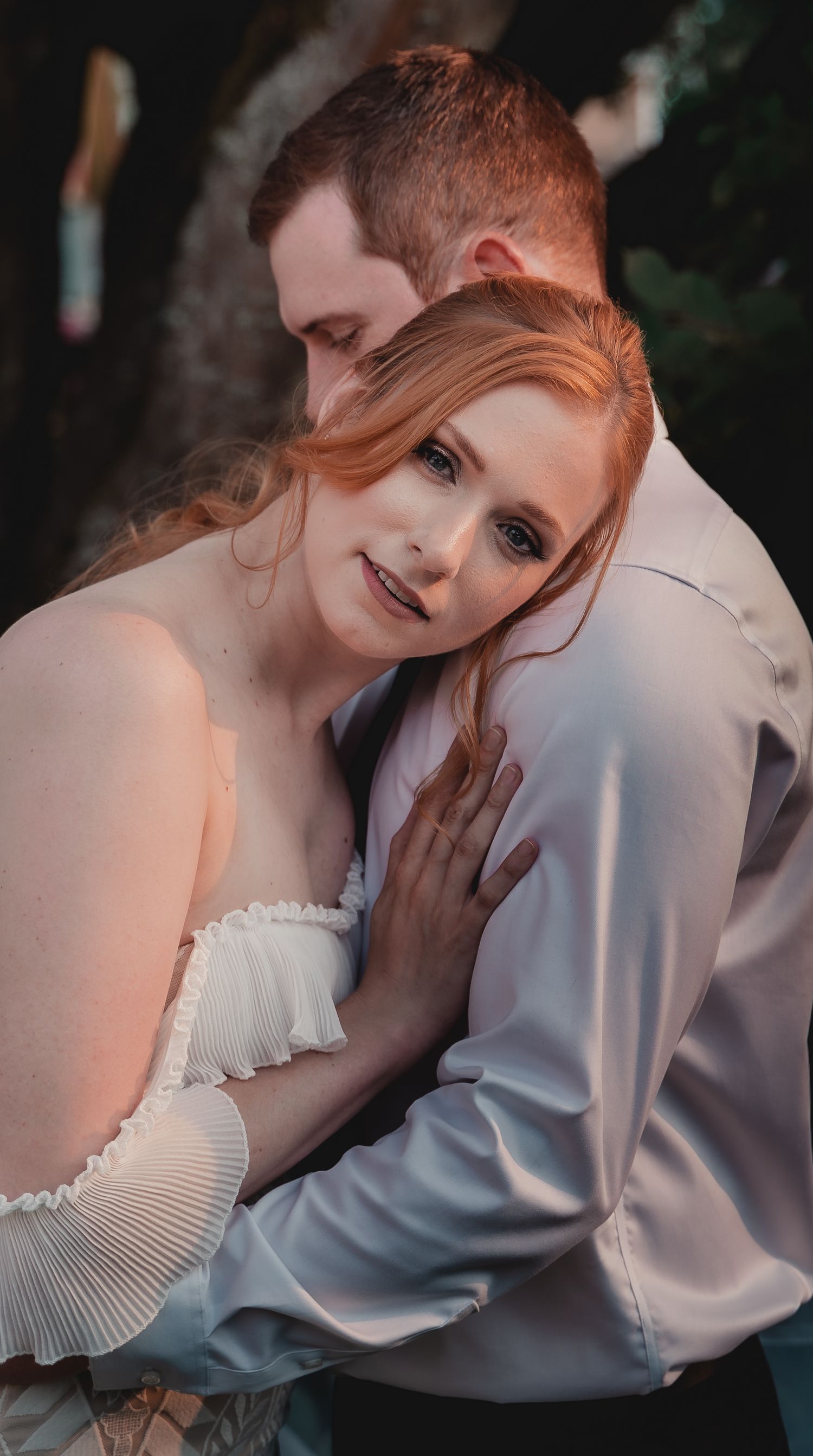 Romantic wedding portrait with soft lighting and delicate lace details.