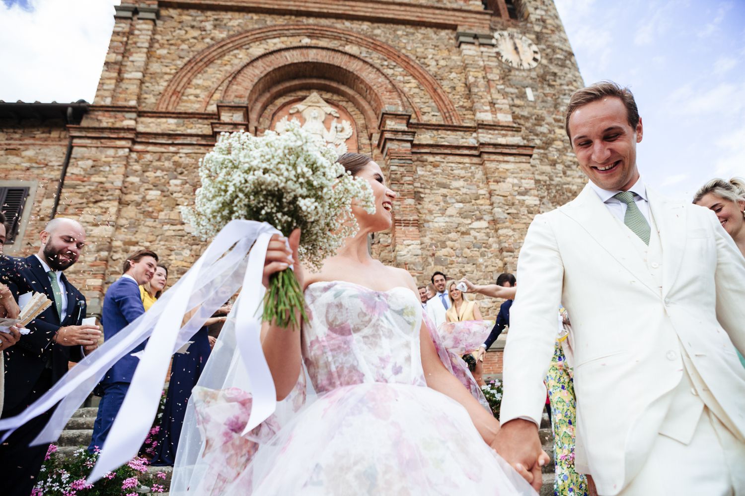 smiling bride and groom after their wedding church ceremony