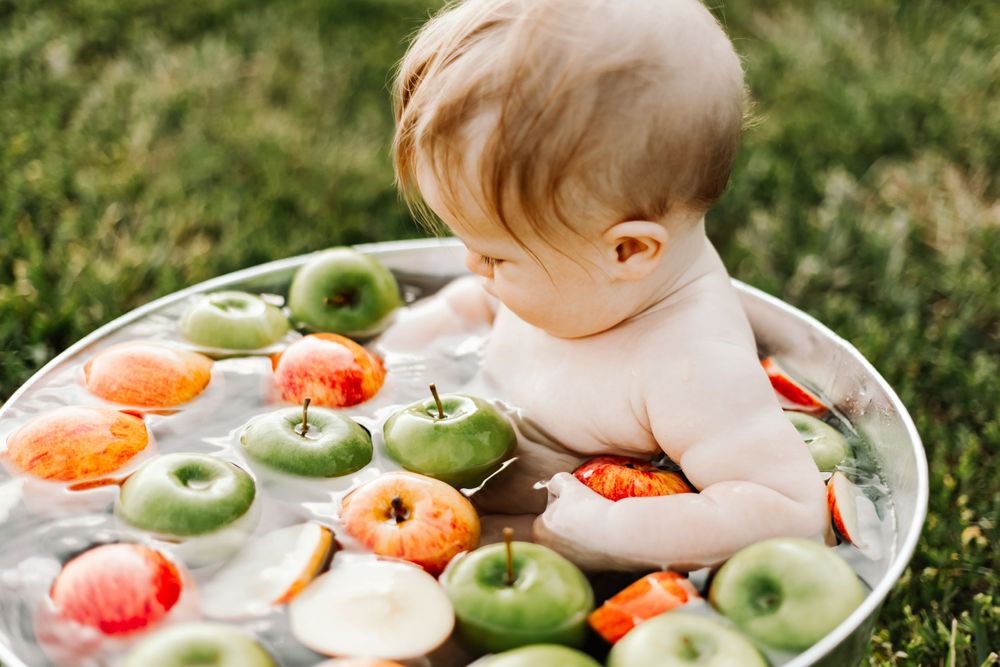 First birthday milestone photos in Maiden NC with cake smash