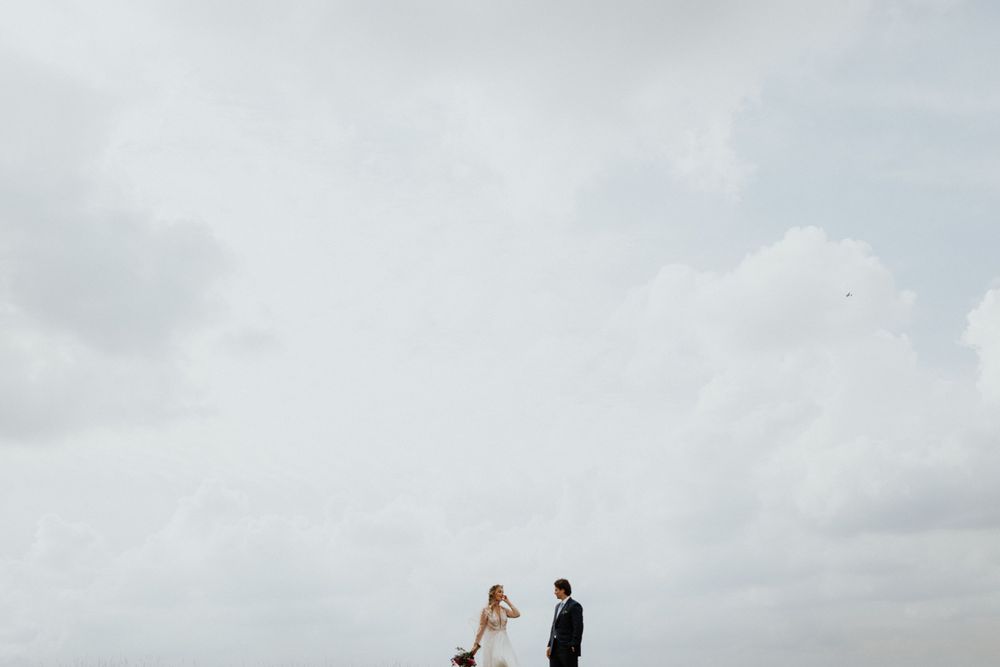 Wedding couple portraits  at Uffington White Horse in Oxfordshire