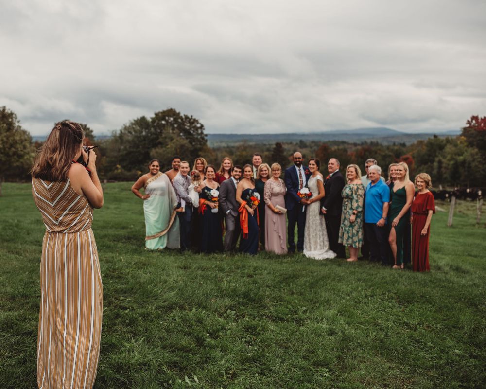Gallagher photography putting together some final touches for a maine backyard wedding