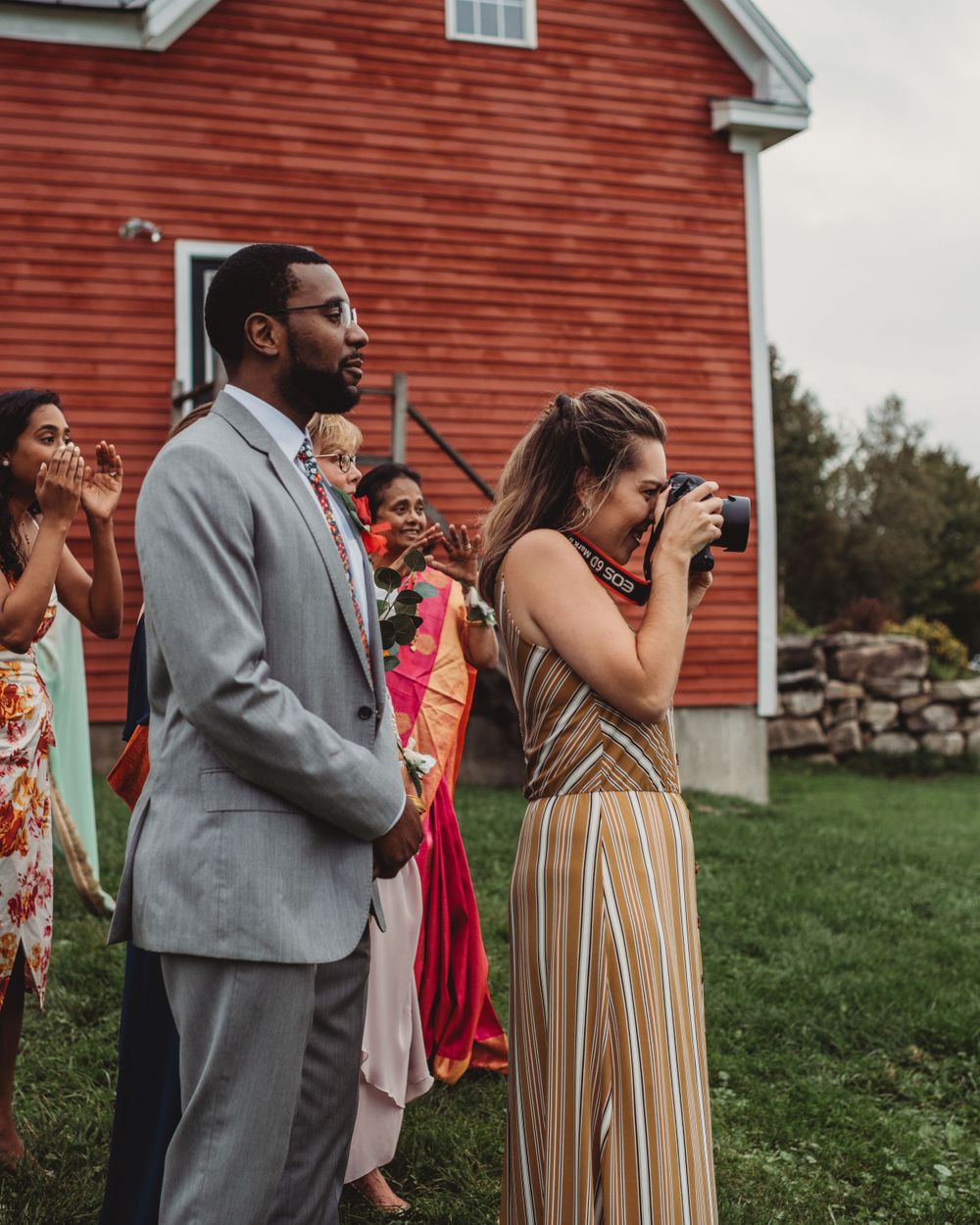 Gallagher photography putting together some final touches for a maine backyard wedding