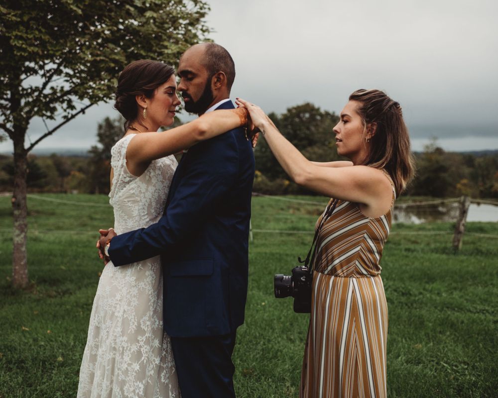Gallagher photography putting together some final touches for a maine backyard wedding