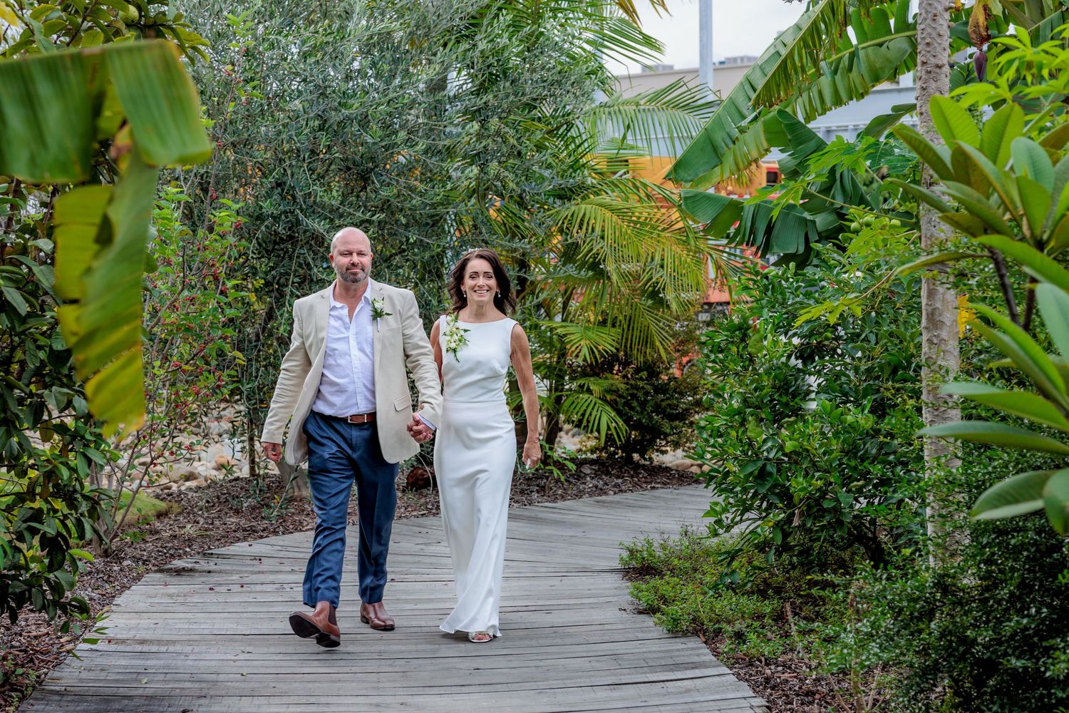 Bride and groom walk down the aisle together