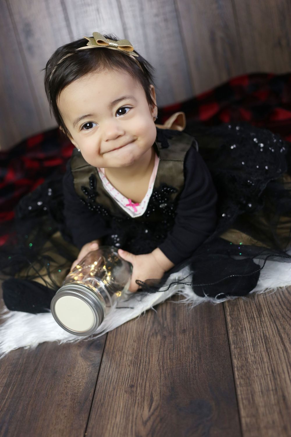 baby girl in black dress