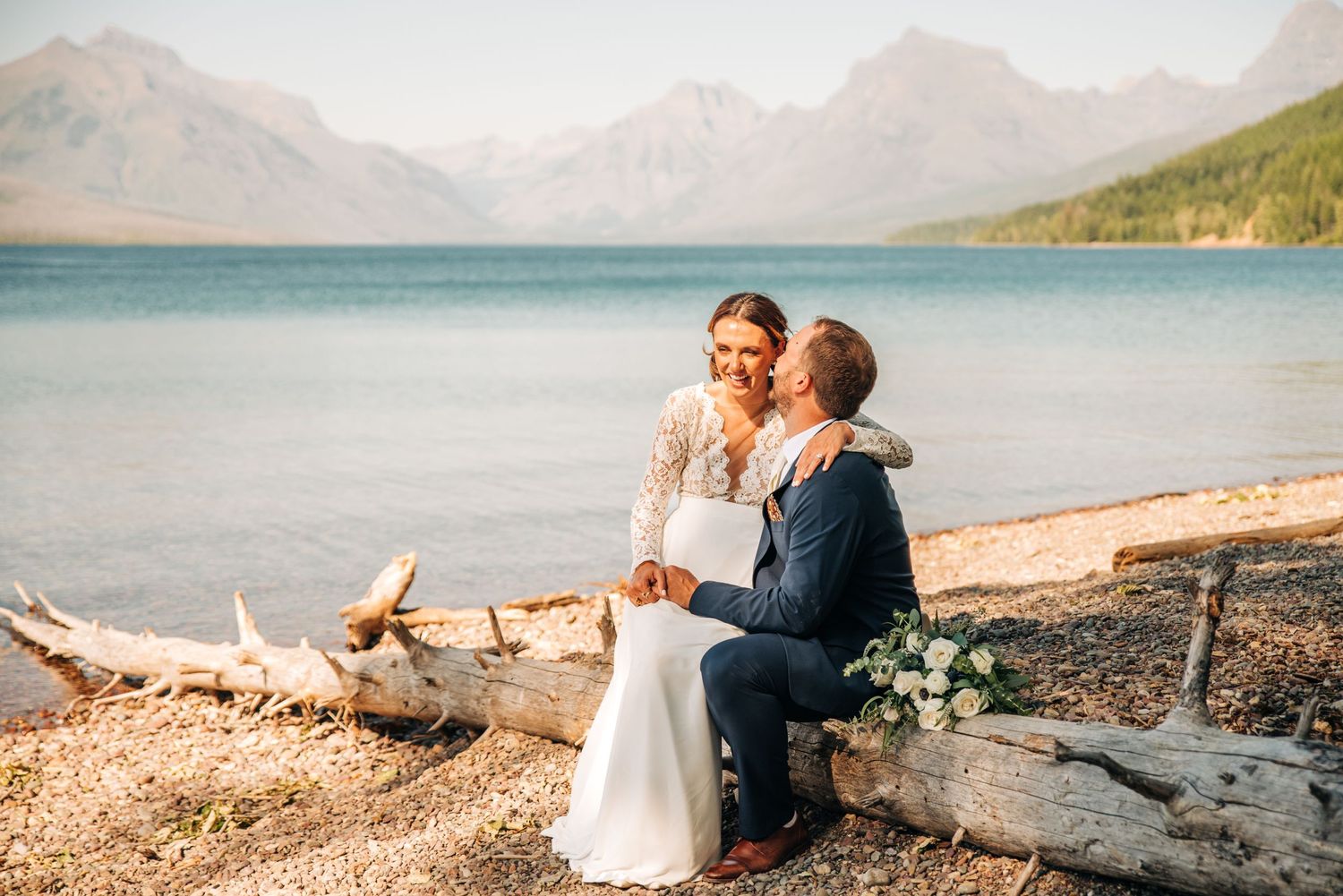 couple getting married at lake McDonald in glacier national park