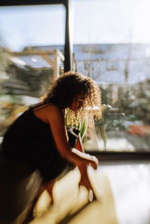 Motion-blur photography sequence capturing dynamic movement in bright sunlit space.