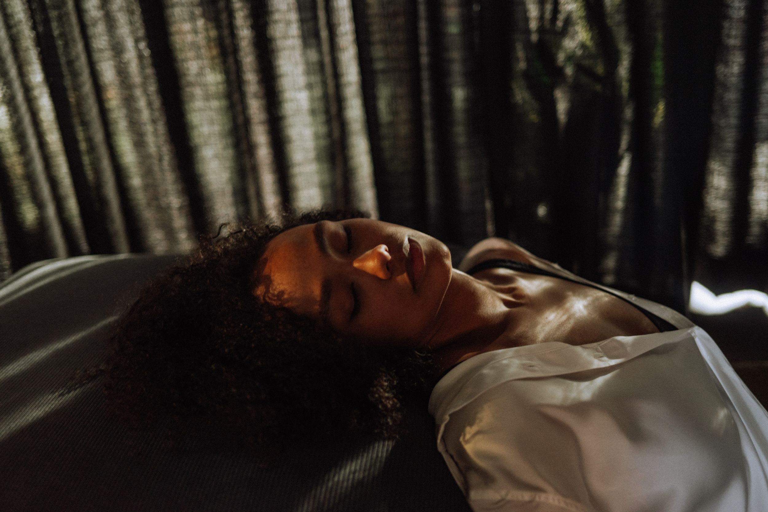 Artistic black and white portraits with dramatic shadows and ethereal lighting effects.