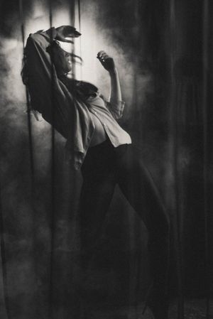 Artistic black and white sequence with flowing movement and shadows.