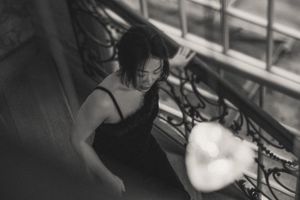 Artistic black and white portrait series showing dramatic shadows and expressions in moody lighting.