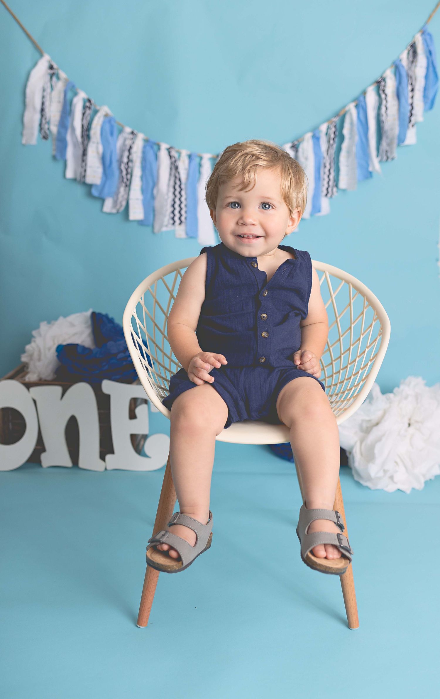 Adorable photoshoot of 1 year old little boy