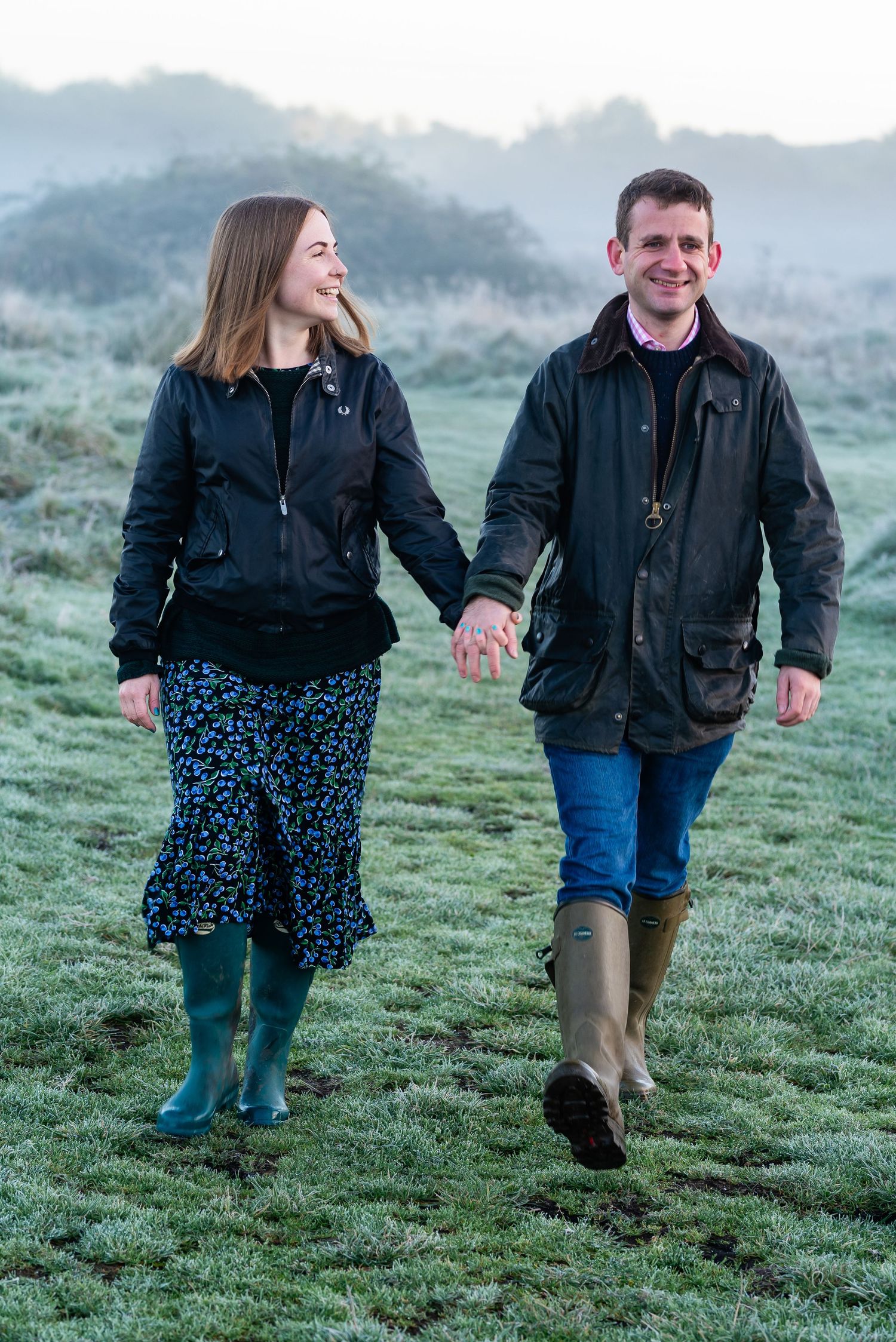 Engaged couple walking hand in hand on Stockbridge Common, National Trust, Engagement Photoshoot, Hampshire,