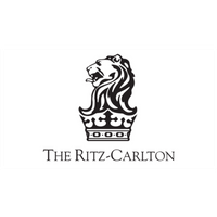 Collection of luxury brand emblems featuring crown and lion symbols.