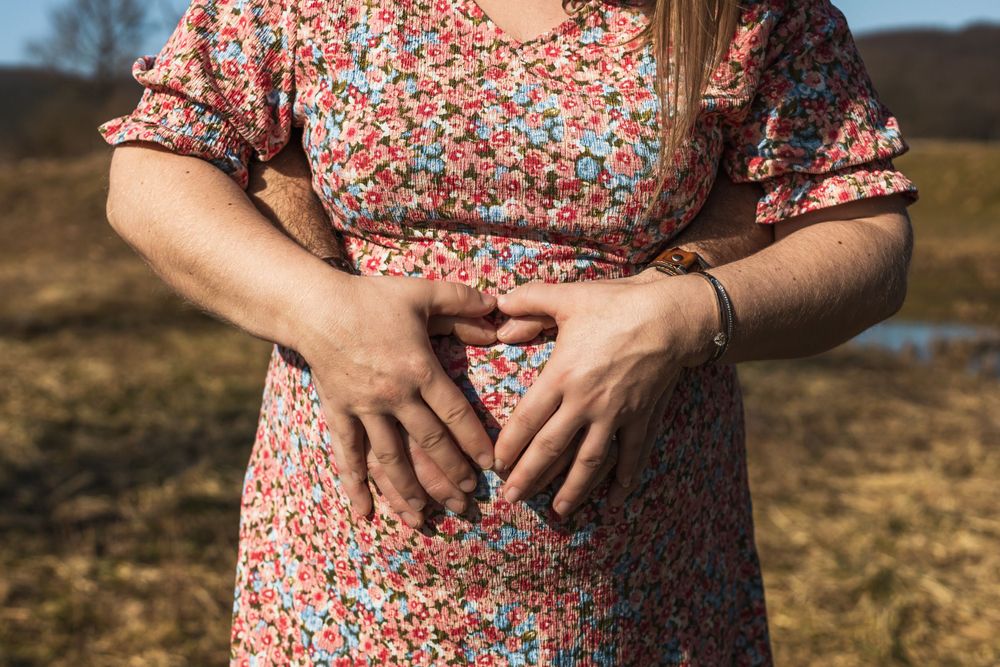 Family photo, baby on the way