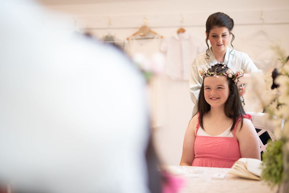 Preparing for a special occasion in a warm indoor setting.