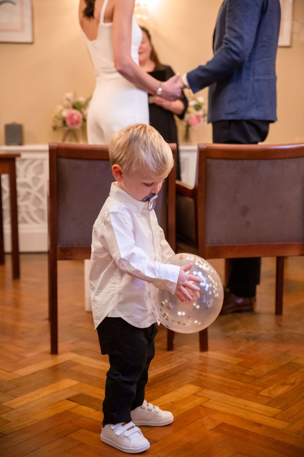 boy plays during wedding