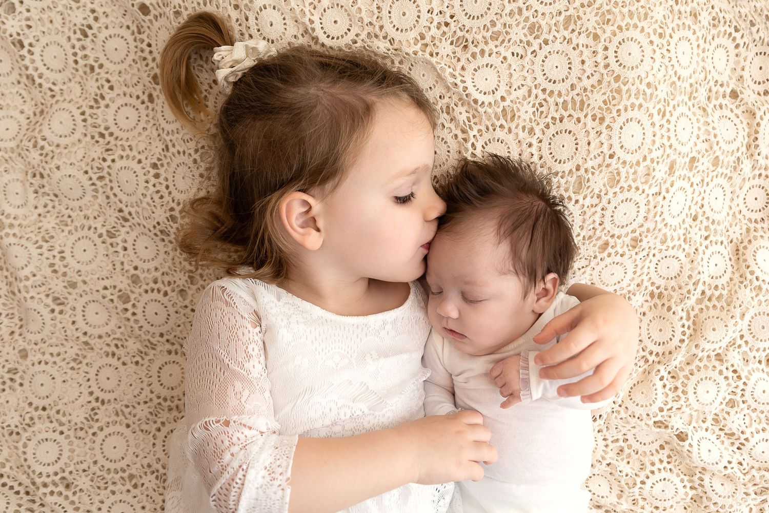 newborn sisters
