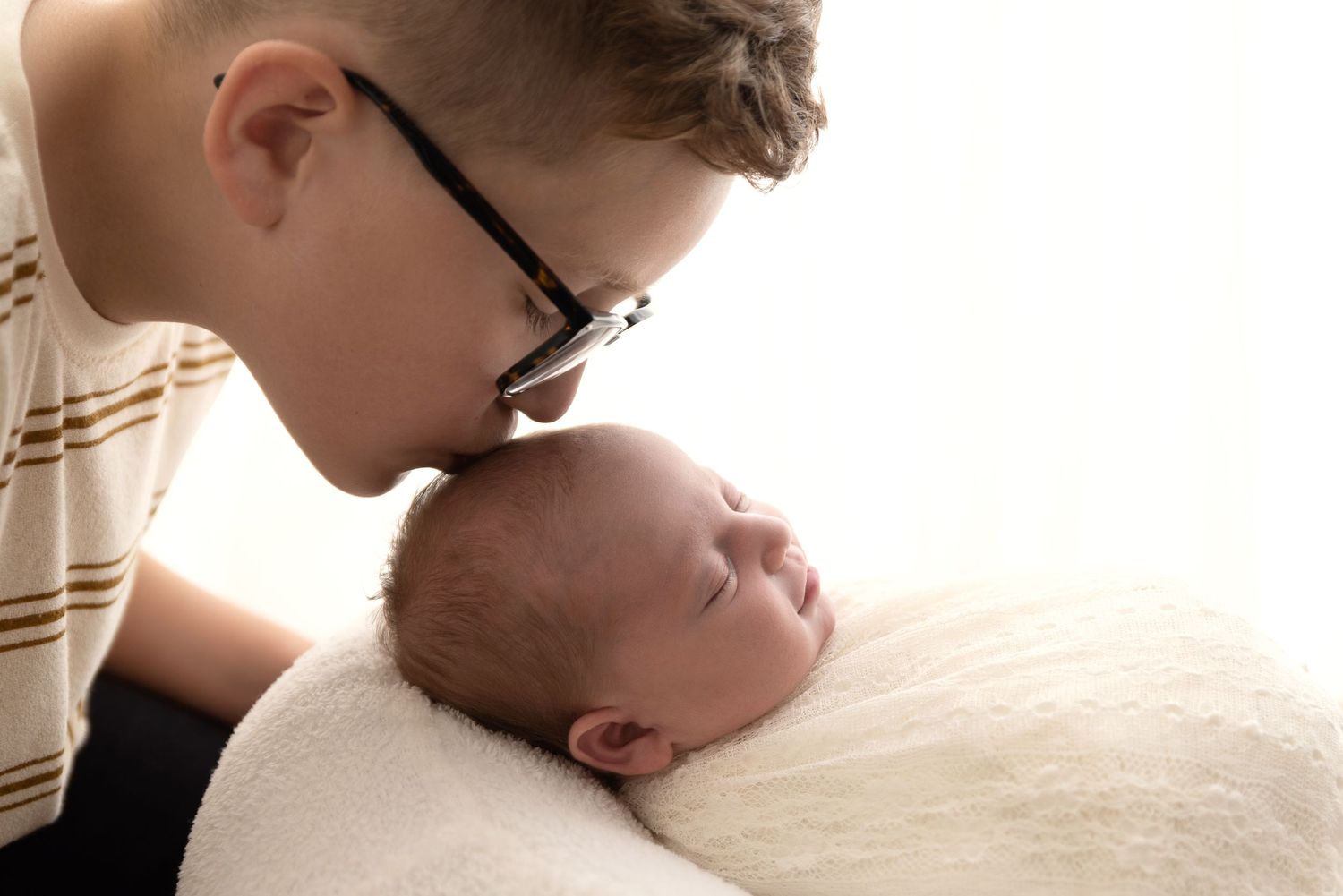newborn boy sibling