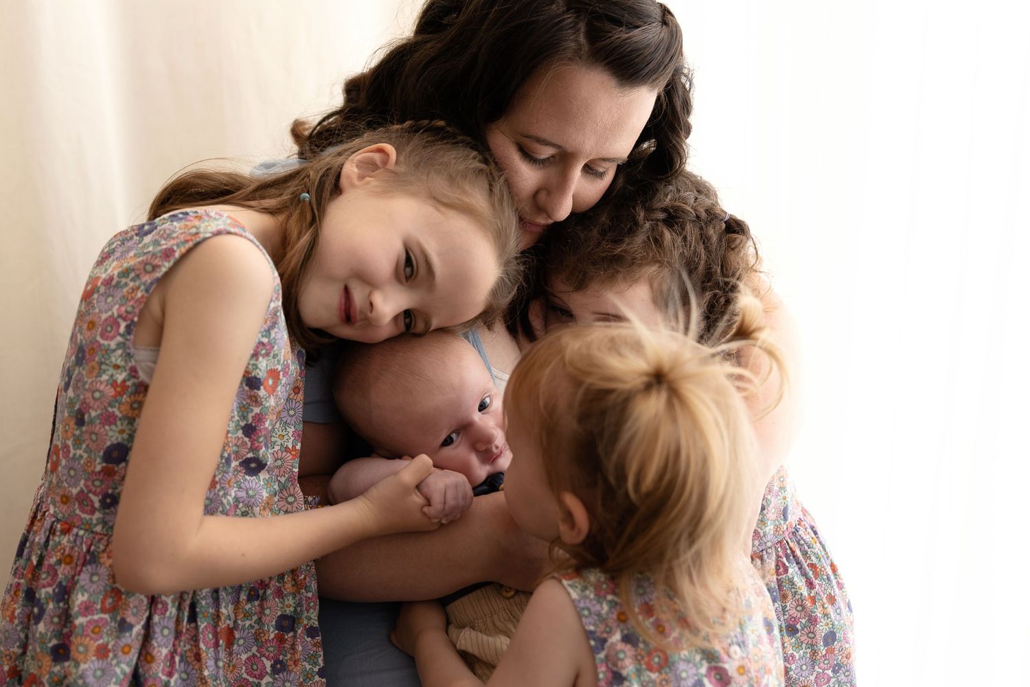 Newborn baby boy siblings family mummy