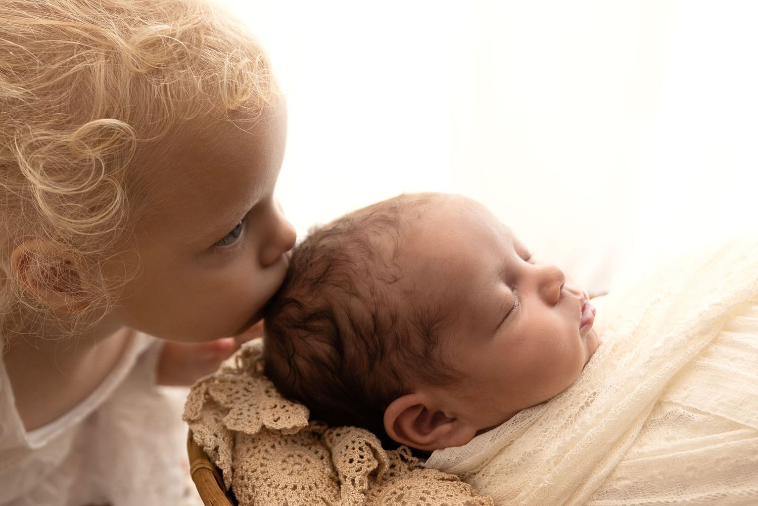 newborn sisters