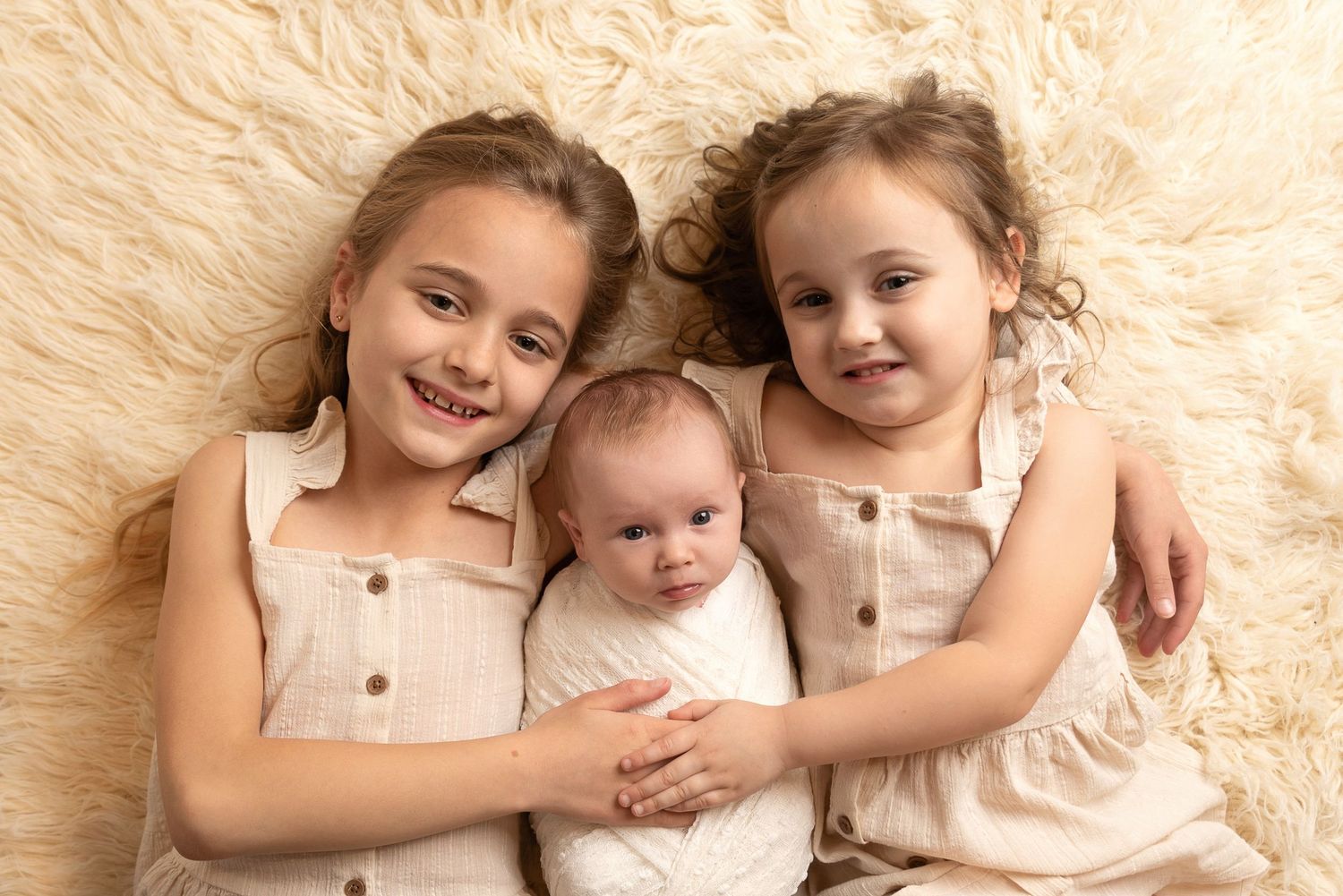 NEWBORN SISTERS