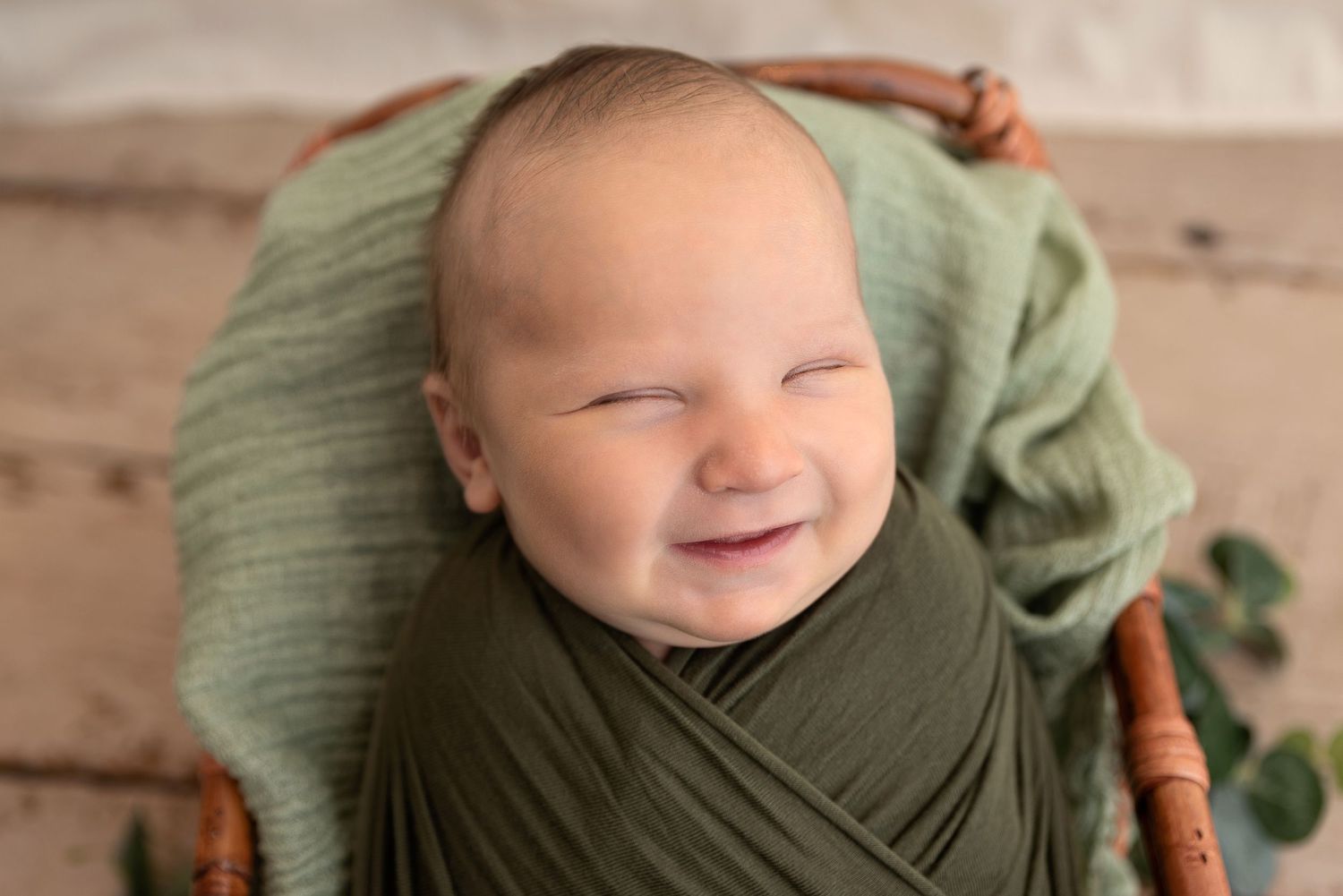 newborn boy smile
