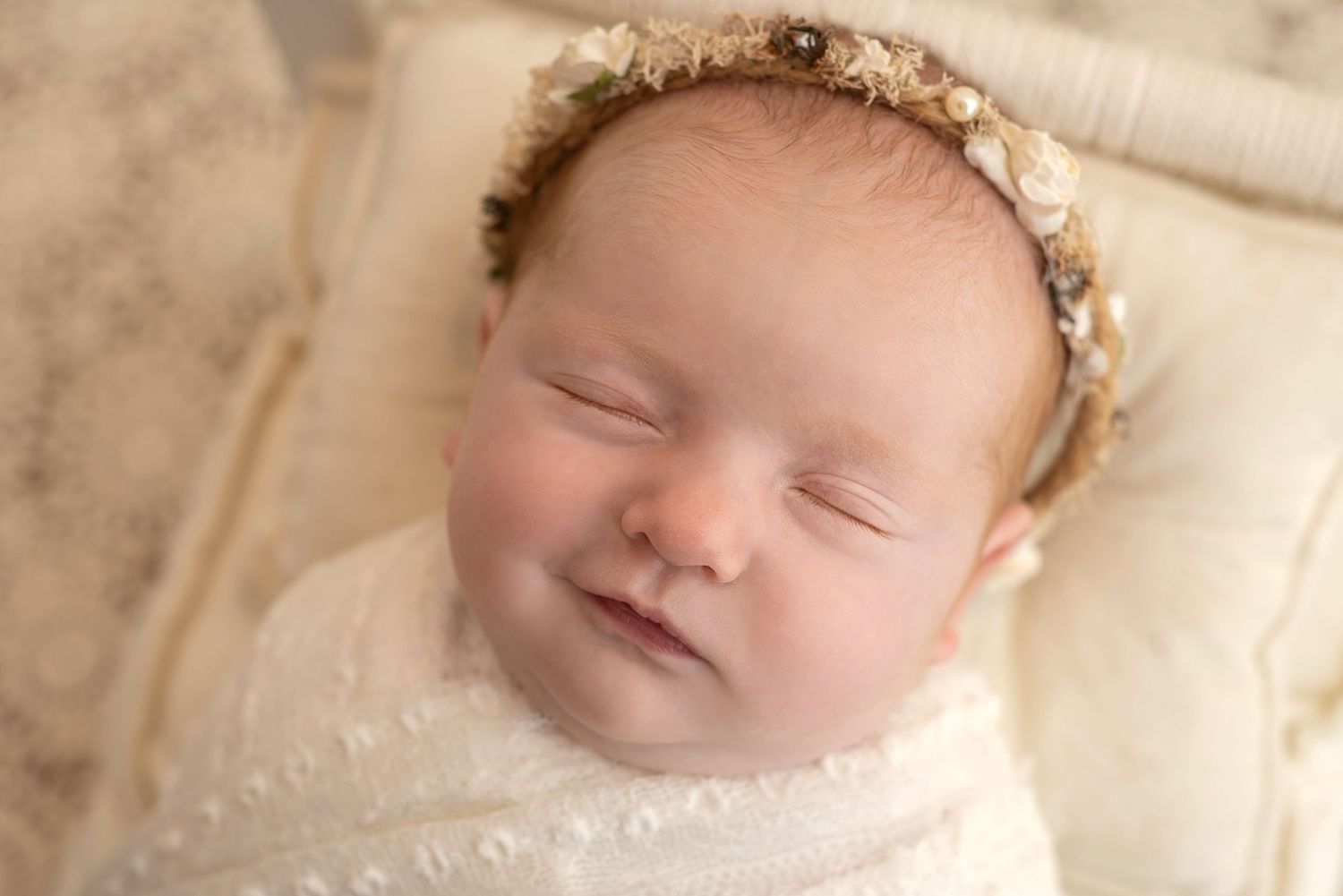 newborn smile girl
